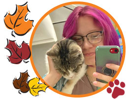 Photo of Asha and a cat