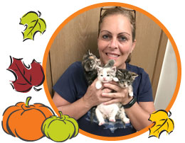 Photo of Pam holding kittens